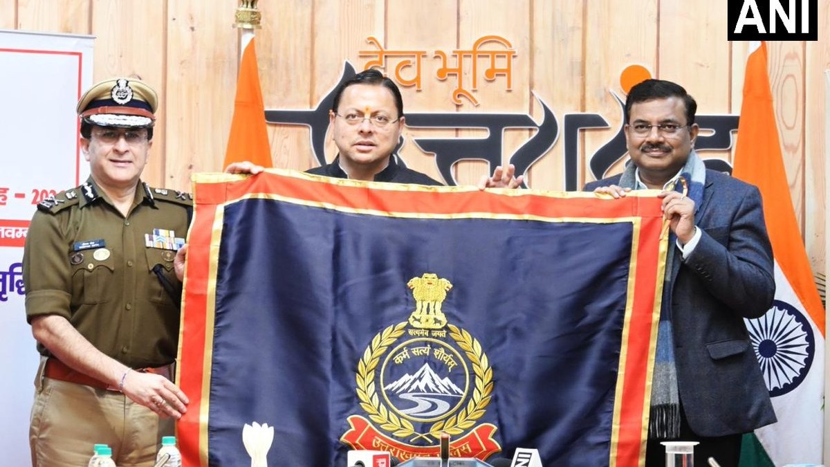 Uttarakhand CM Dhami unveils new police flag, insignia and ceremonial uniform during ceremony
